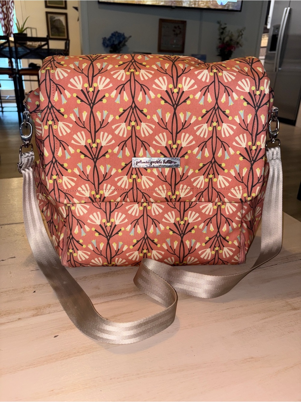Petunia Pickle Bottom Coral Floral Baby Bag with Champagne Strap